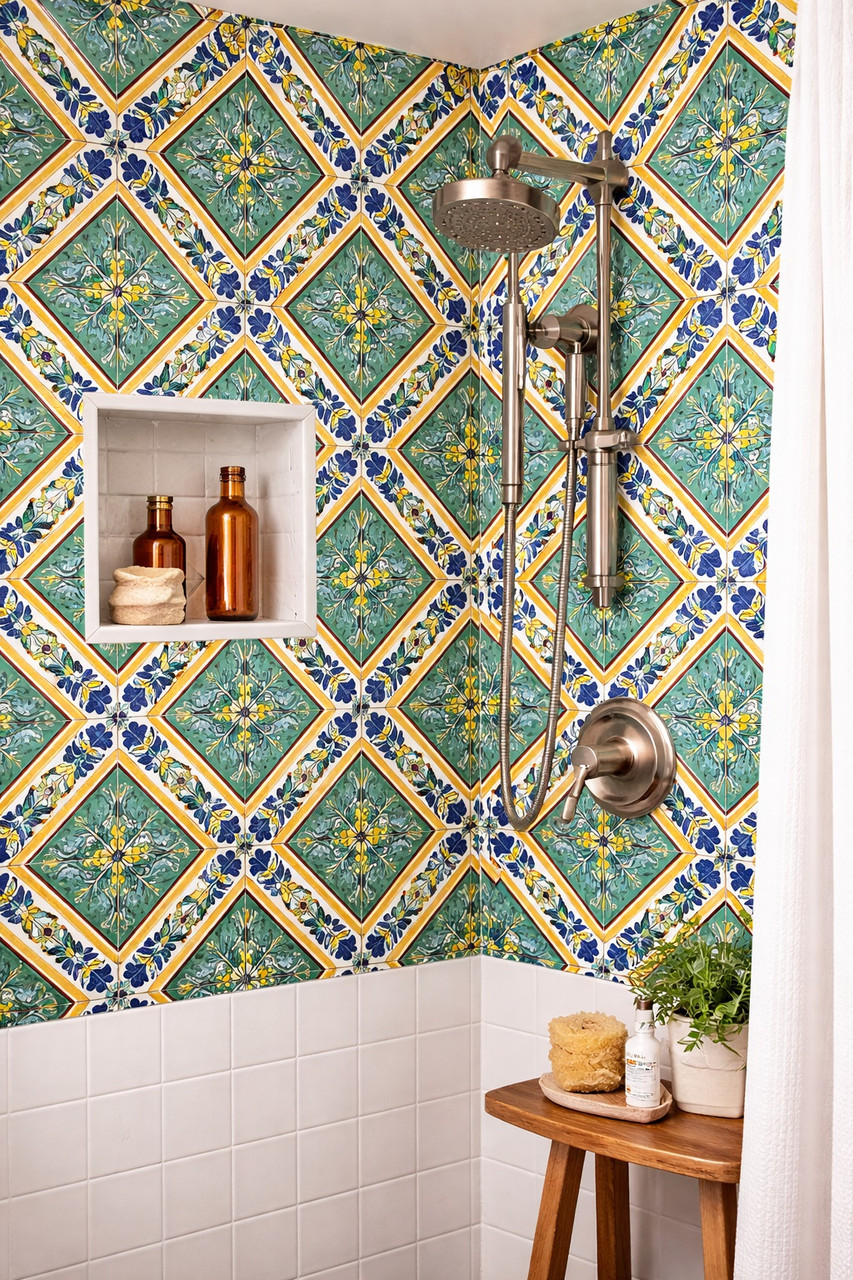 Diagonal floral border talavera tile featured in a bathroom shower with balanced color contrast