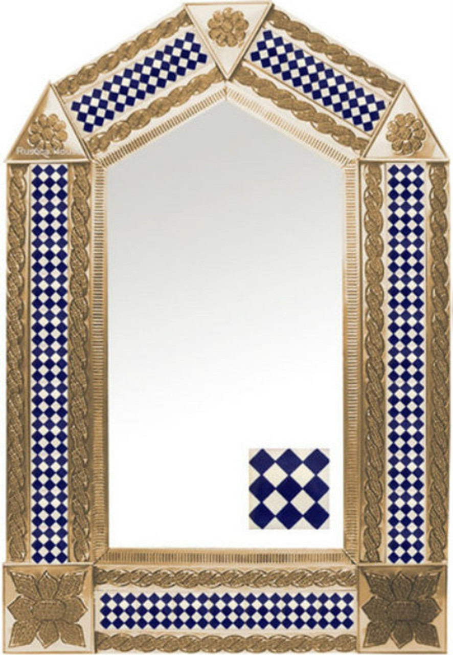 tin mirror with copper frame and rustic tile