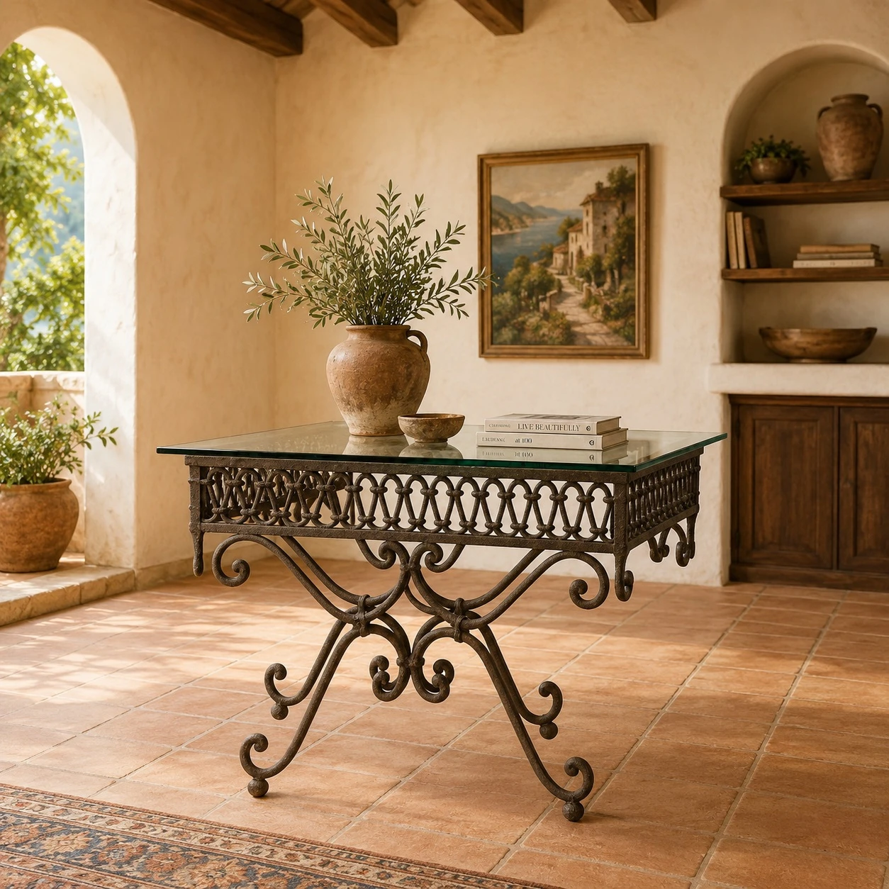 Spanish colonial style wrought iron table base with glass top in a Mediterranean interior