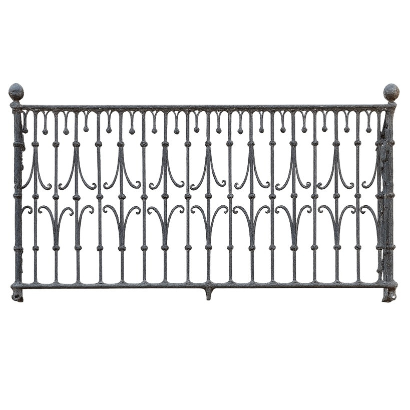 Wrought iron balcony railing with vertical scroll and drop motif