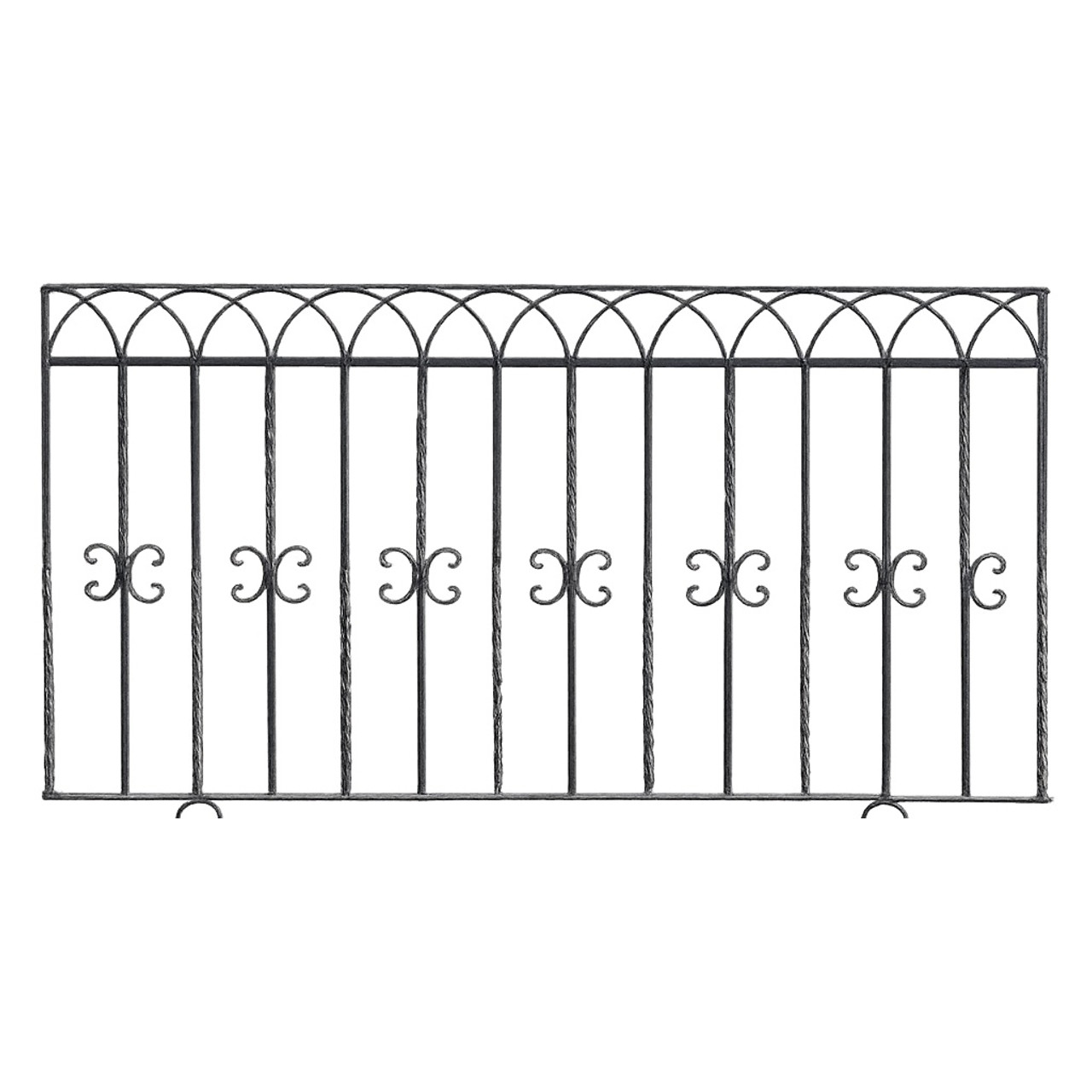 Wrought iron balcony railing with arched and twisted bars
