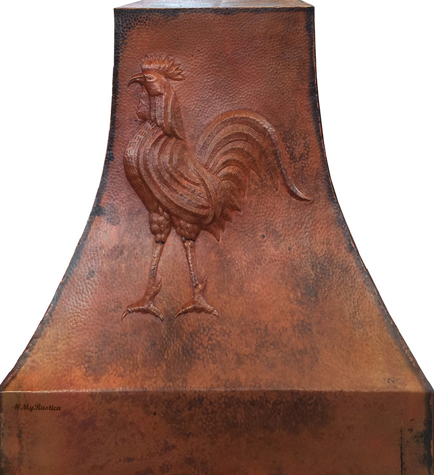 Copper vent hood with punched rooster motif and hammered apron for rustic farmhouse kitchens