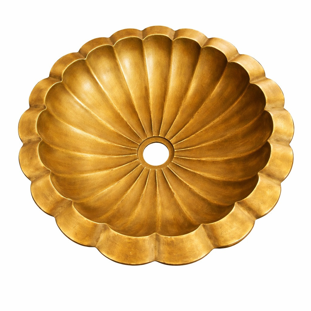 Brass scalloped shell bathroom sink with radial fluted design with warm golden finish