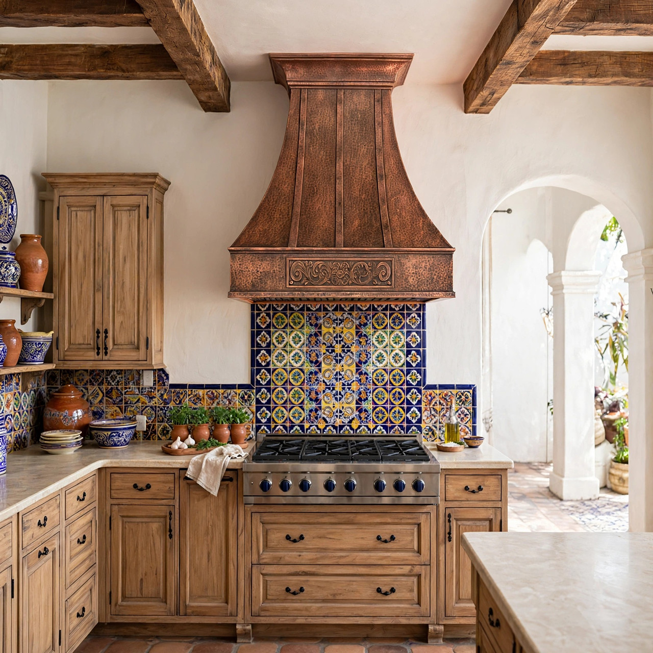 Custom embossed apron copper range hood with bell canopy, hacienda wall mount