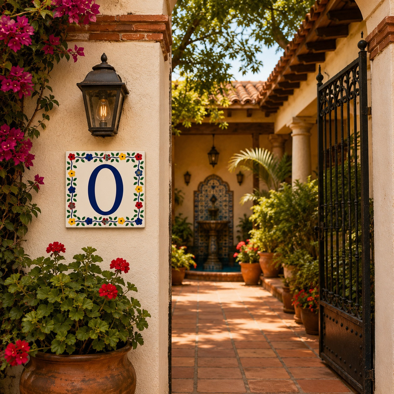 Talavera tile plaque number zero with Mexican floral border showcased on a colonial patio entrance with classic Mexican design elements