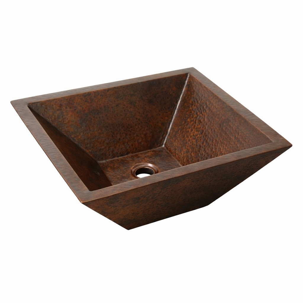 Angled view of a double wall rectangular copper vessel bathroom sink with tapered sides and drain located on the center
