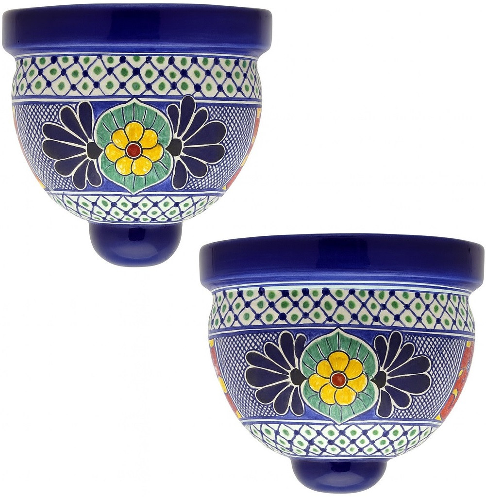 Two Mexican talavera wall sconces with cobalt blue and yellow medallion design