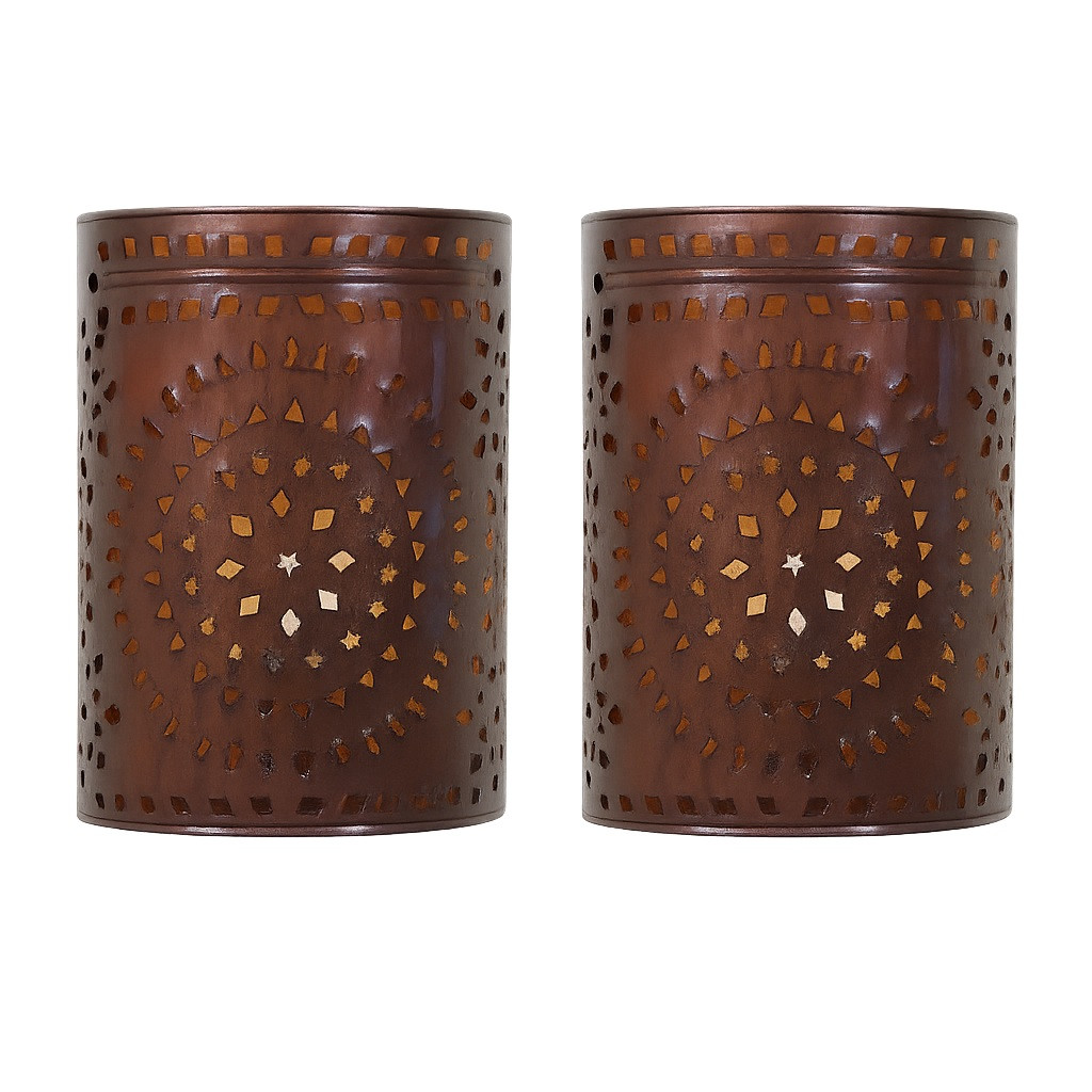Two rustic star pattern wall sconces from Mexico