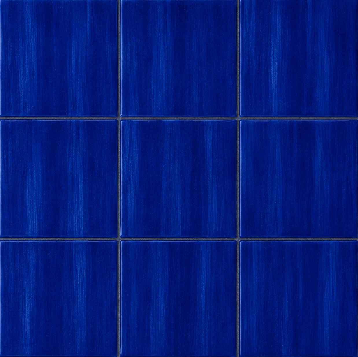 Mexican dark blue tiles with rich cobalt glaze arranged in a 3x3 handcrafted tile layout
