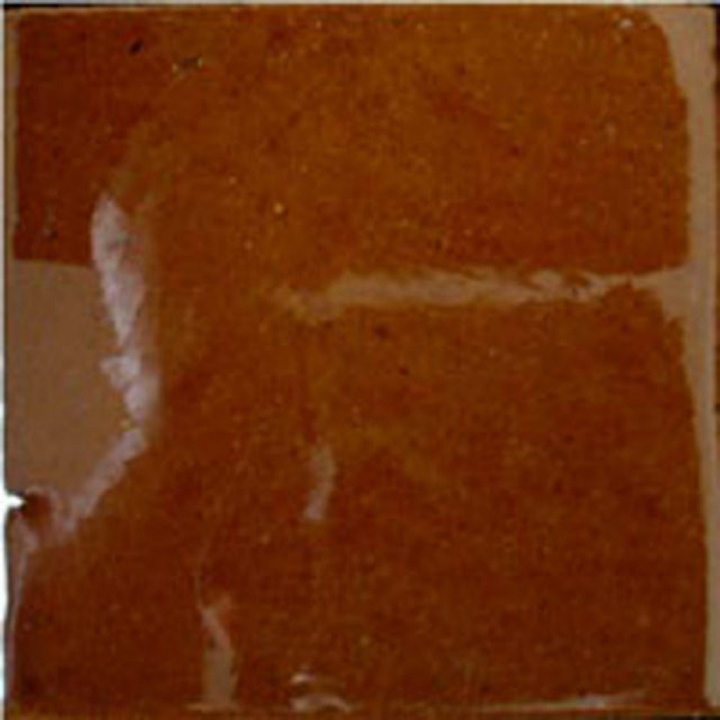 Mexican terra cotta Talavera tiles for walls and backsplashes, warm earthy glazed ceramic surface with handcrafted artisan character