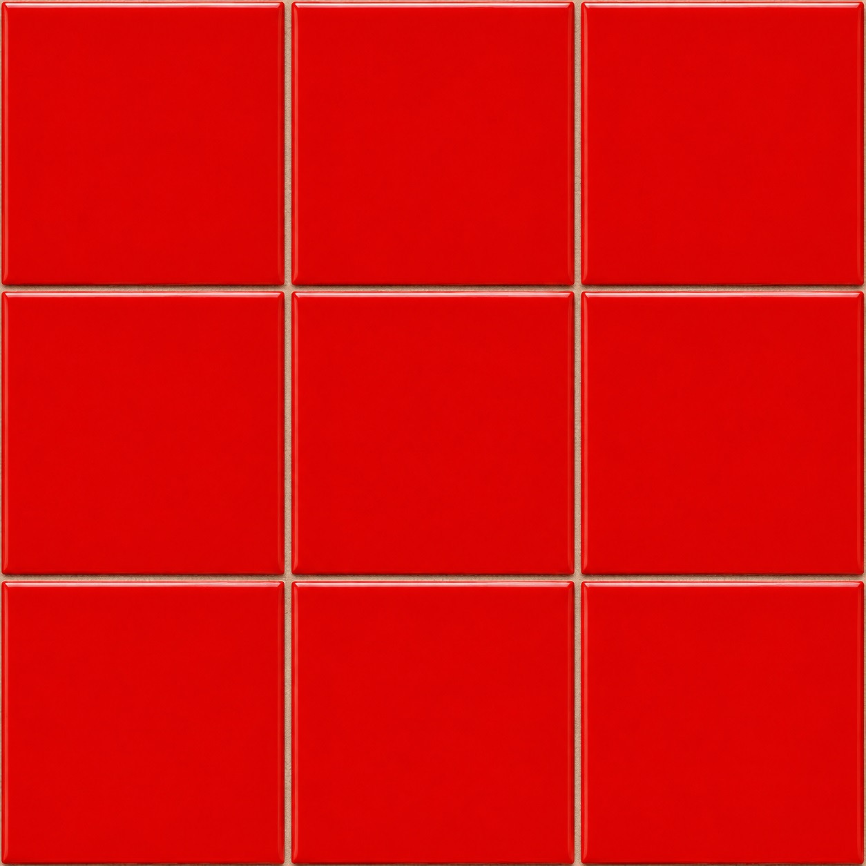 Handmade solid red Mexican talavera tiles for bold vibrant interiors shown as a 3x3 tile installation
