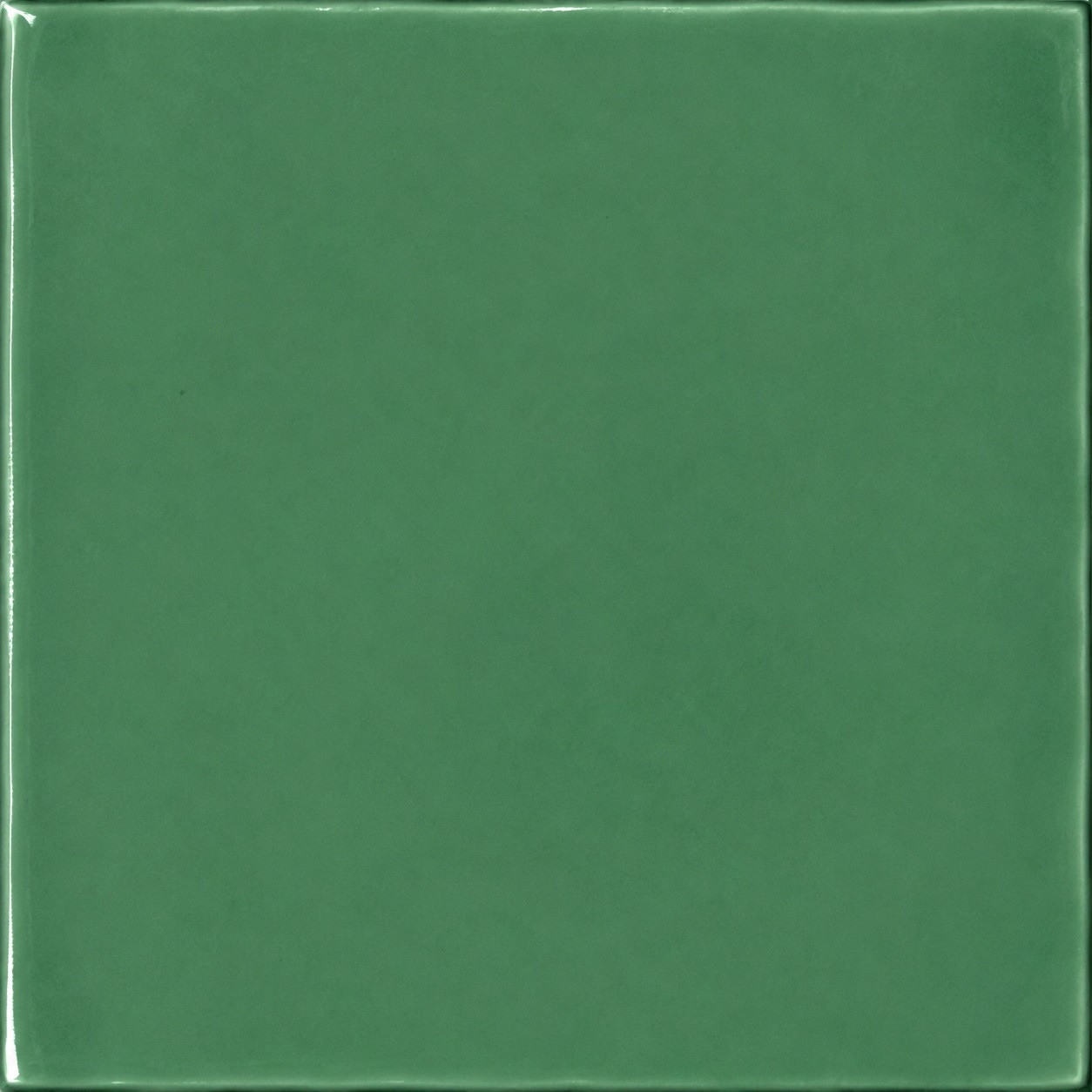 Handmade washed green Mexican talavera tiles for serene interiors