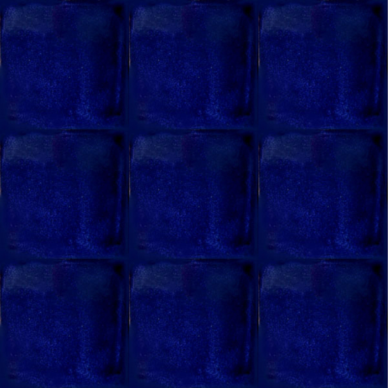 Nine emerald green Mexican ceramic tiles with glossy handcrafted glaze and artisan finish