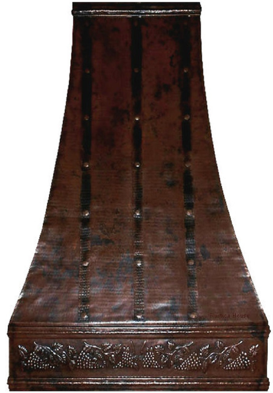 Tall  hammered copper range hood with decorative apron