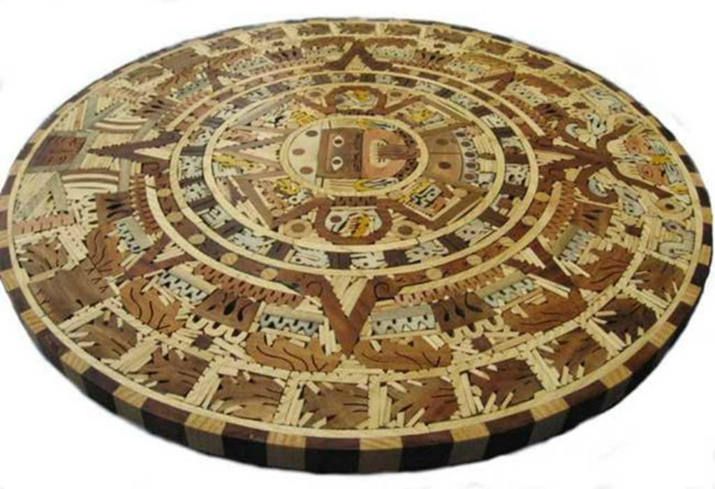 Round wood Aztec calendar, side view