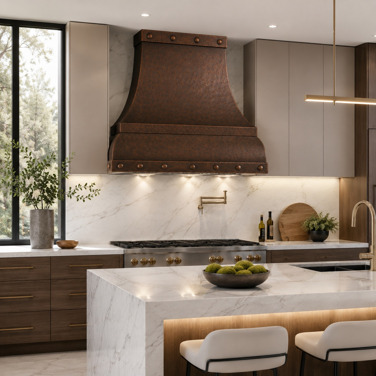 Hammered curved apron copper range hood in a luxury contemporary kitchen with minimalist cabinetry, marble, and warm wood accents