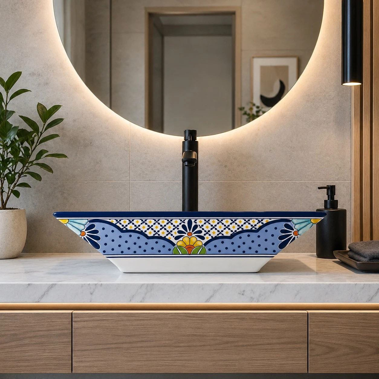 Blue floral talavera vessel rectangular sink above countertop in a modern bathroom with neutral tones and clean lines
