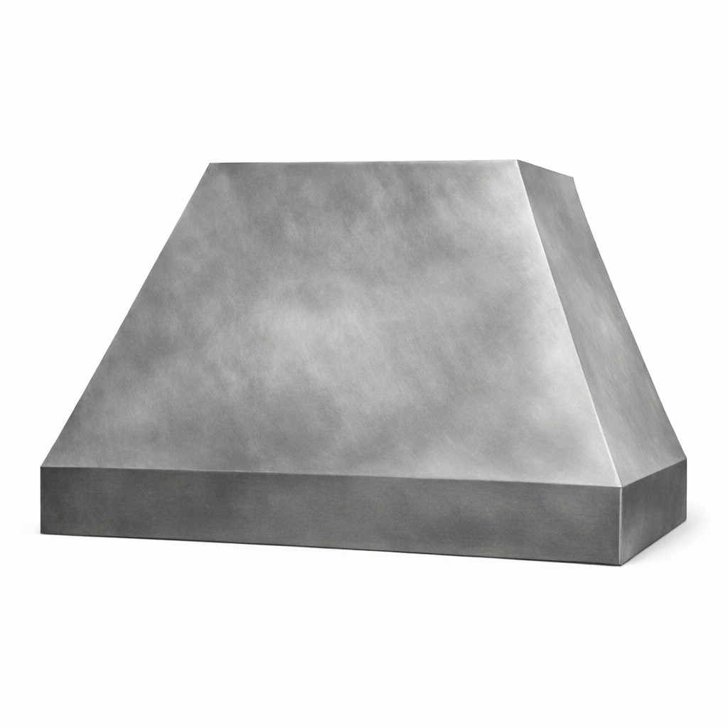Angled view of a minimalist smooth zinc range hood with a tapered silhouette