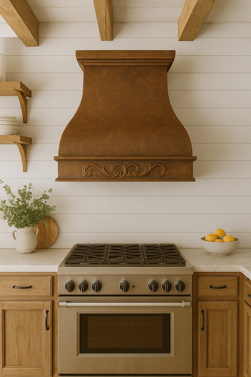 Copper range hood with apron scroll in farmhouse kitchen, smooth canopy with decorative band above range and wood accents