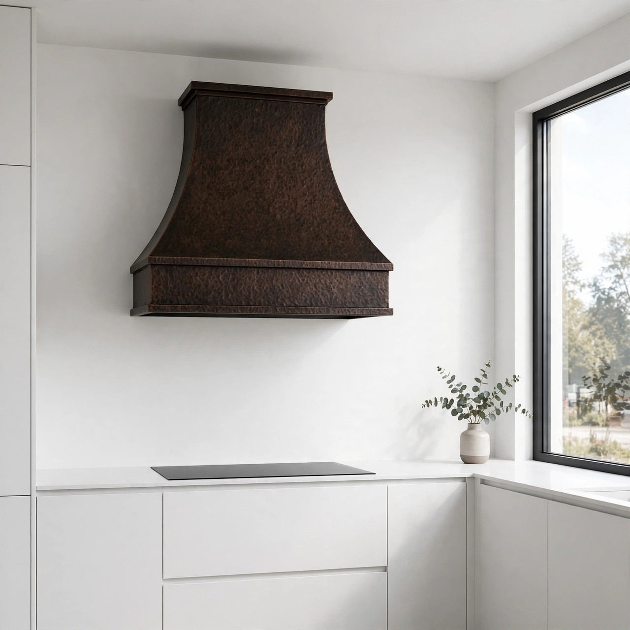 Contemporary minimalist kitchen with minimalist bell copper wall hood, clean cabinetry, and simple range wall