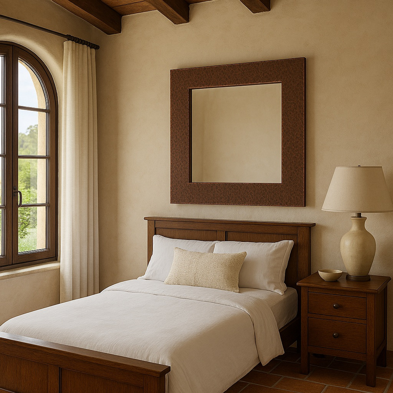 Square hammered copper mirror in a Mediterranean-style bedroom with terracotta flooring