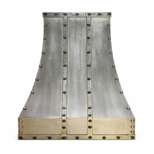 Loft style steel range hood with riveted straps and a tall bell profile and industrial feeling