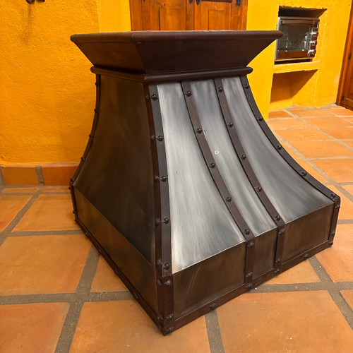 Small kitchen iron range hood front perspective side view