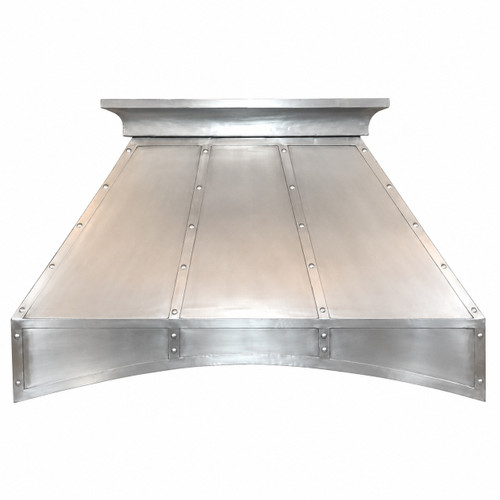Handcrafted pewter range hood with Mexican design isolated on white background, front elevation view