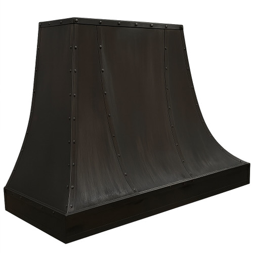 Black zinc kitchen range hood with trapezoidal canopy angled view with flared base, riveted seams, and brushed industrial finish