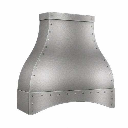 Angled view of a softly hammered zinc bell range hood with riveted canopy and curved apron on white