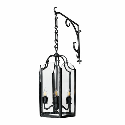 Traditional brass lantern chandelier with scroll bracket in rustic black finish, clear glass and three candle lights for hospitality spaces