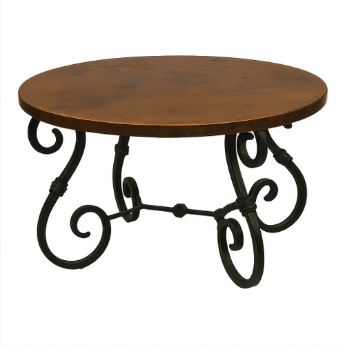 Copper table with Spanish colonial iron base shown in round format with elegant scrollwork legs