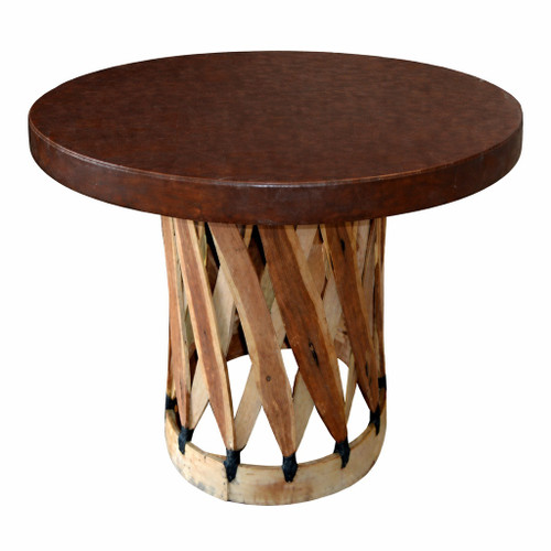 Round equipal table with a dark tobacco pigskin top
