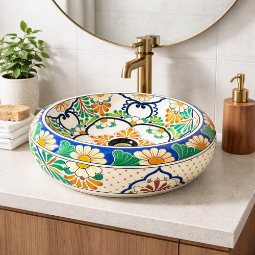 Round talavera vessel Mexican bathroom sink white floral in modern bathroom with clean neutral design
