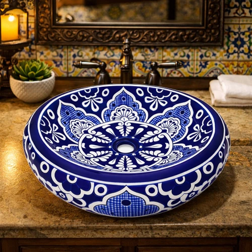 Talavera bathroom vessel sink blue white floral design in restaurant restroom with artisan decor