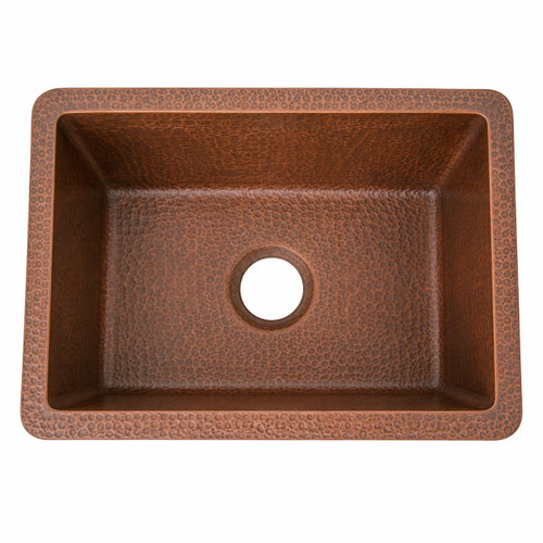 Hammered undermount copper coctail bar sink with rectangular basin shown in top view