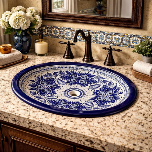 Classic cobalt talavera bathroom sink featured in a house bathroom as a refined handcrafted focal element