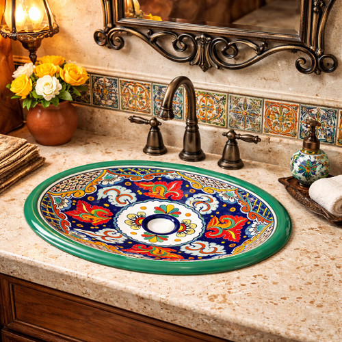 Cobalt multicolor talavera bathroom sink installed in a Spanish Revival house bathroom with artisan accents