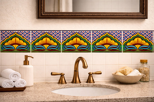 Mexican tile sunburst arch decorative border design installed as a bathroom wall border with handcrafted detail