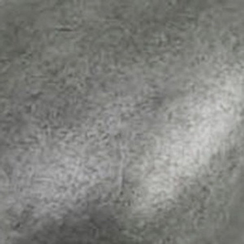 Close-up of the natural finish, showing the handcrafted detailing on the Colima iron mirror.