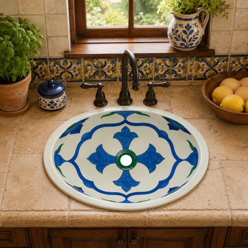 Talavera bathroom sink blue quatrefoil placed on a kitchen counter bringing clean geometric design to a warm interior