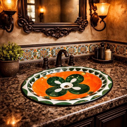 Orange green talavera bathroom sink featured in a restaurant restroom highlighting Mexican artisan design