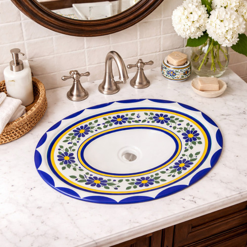Talavera blue yellow floral sink featured in a house bathroom as a refined handcrafted focal element