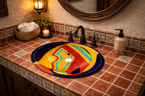 Mexican folk art bathroom sink styled in a rustic house bathroom highlighting expressive Mexican folk art