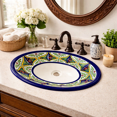 Talavera cobalt green medallion sink shown in a house bathroom as a bold handcrafted focal element