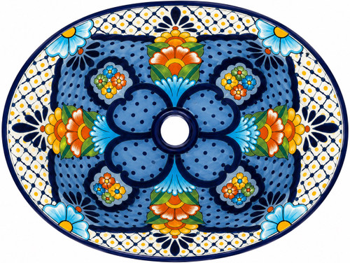 Mexican bathroom sink with colorful petal pattern