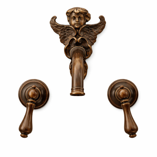 Ornate cherub wall-mounted bronze faucet with classic European design front view