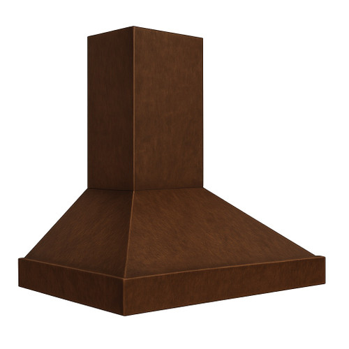 Detailed view of strap-free copper range hood showing hammered texture, clean canopy planes and box apron