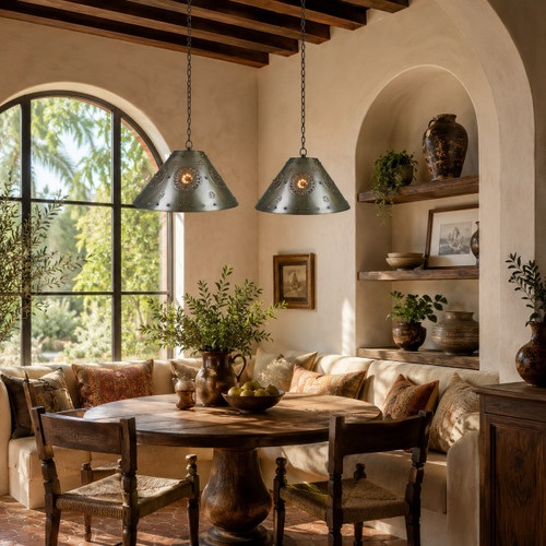 Two rosette punched tin cone pendants with jewels in a Spanish Revival breakfast nook