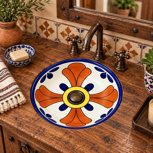 Round talavera bathroom sink terracotta cross pattern Mexico in a rustic wood vanity
